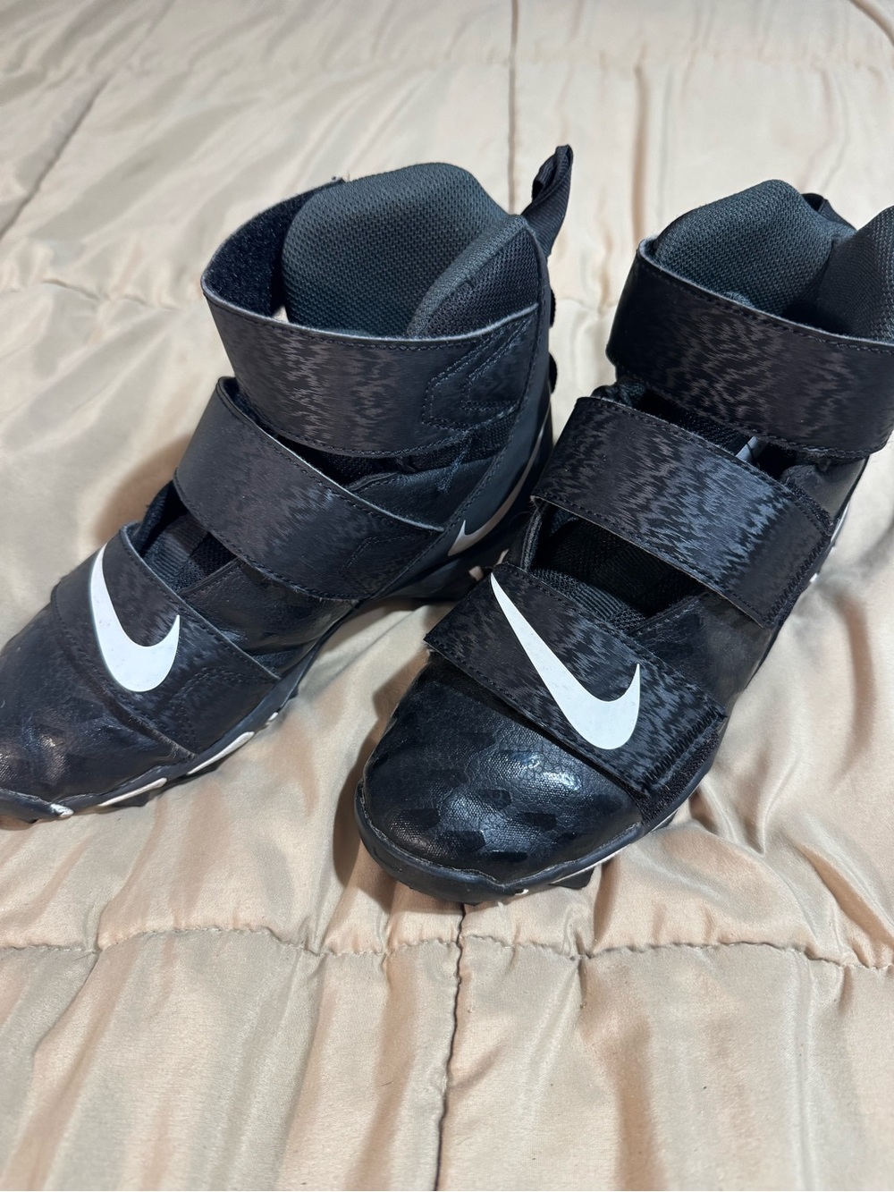 Nike Kids Black and White High-Top football cleats